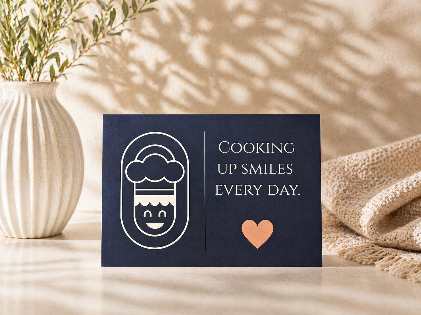 A fun and heartwarming greeting card for anyone who deserves a smile. With its cute chef-inspired illustration and “Cooking Up Smiles Every Day” message, this card adds a playful touch to gifts for food lovers, home cooks, chefs, or anyone who brings joy to your life.
A lovely choice for thank-you gifts, birthday gifts, kitchen-themed presents, or thoughtful everyday surprises.