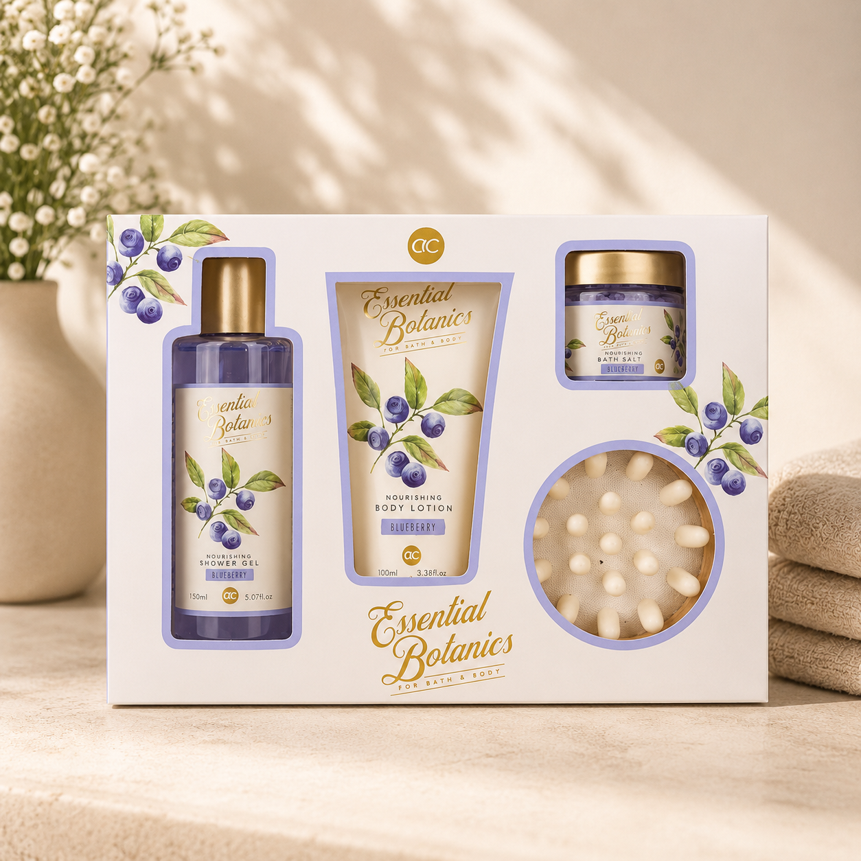 Essential Botanics Blueberry Bath Gift Set featuring nourishing shower gel, body lotion, bath salts, and massage sponge in elegant botanical packaging displayed on a soft neutral background.