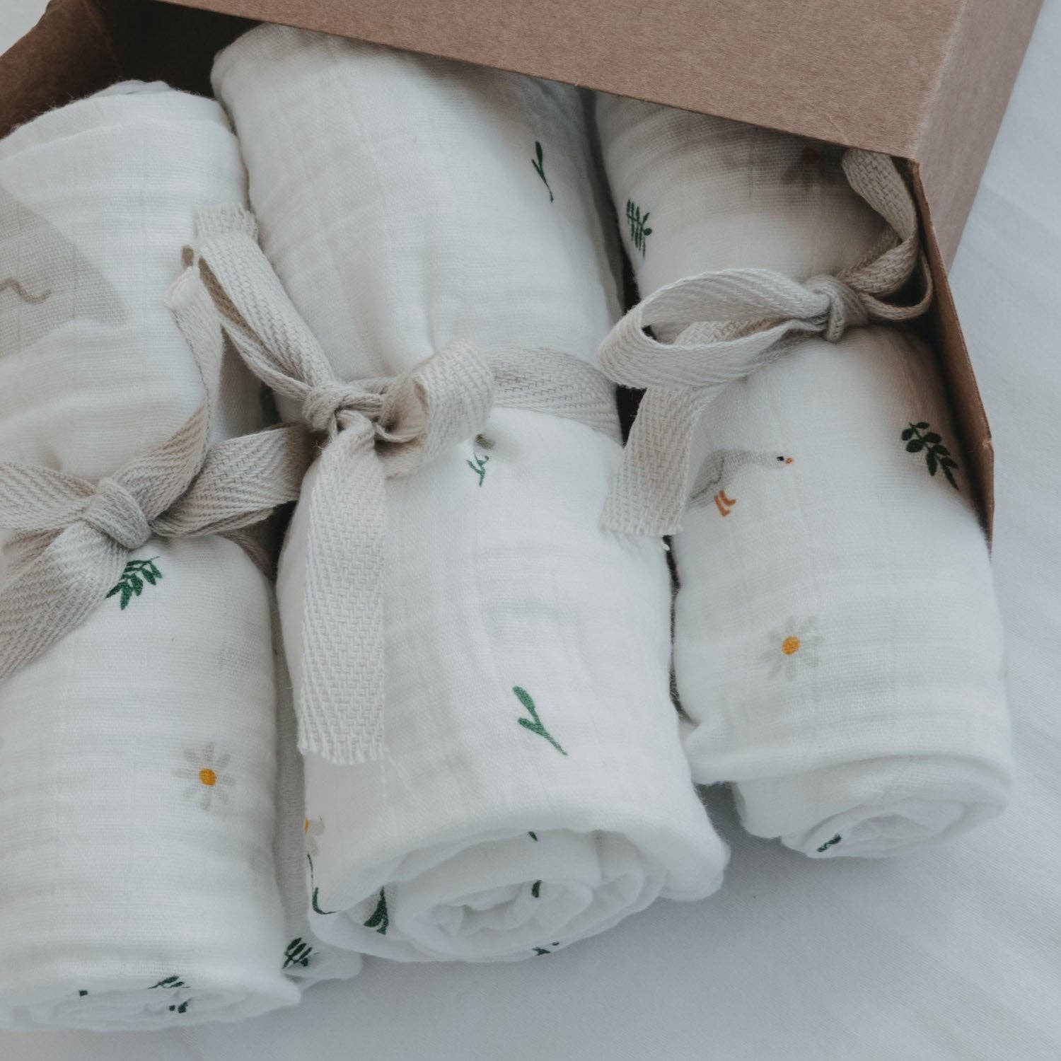 Goose Family 3-piece cotton muslin cloth set with goose, floral and family designs for babies.