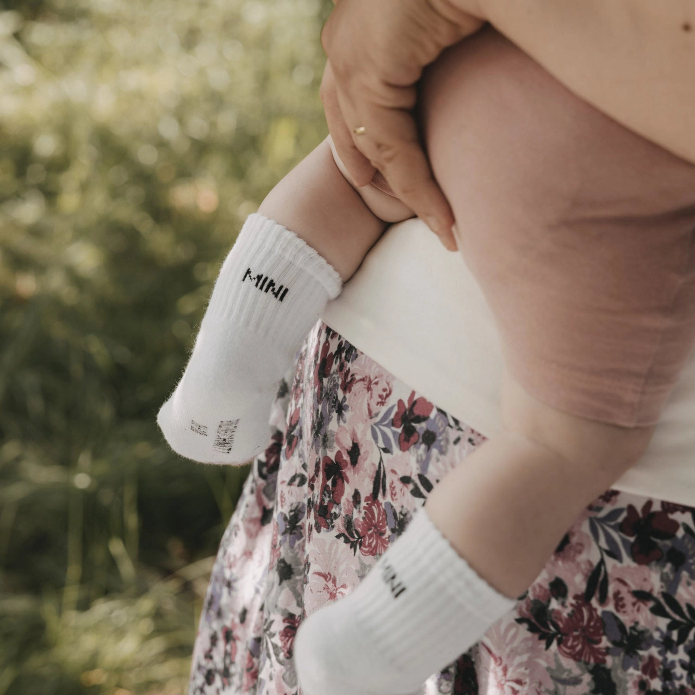 Soft Mini baby socks with minimalist lettering for newborns and sensitive baby skin.