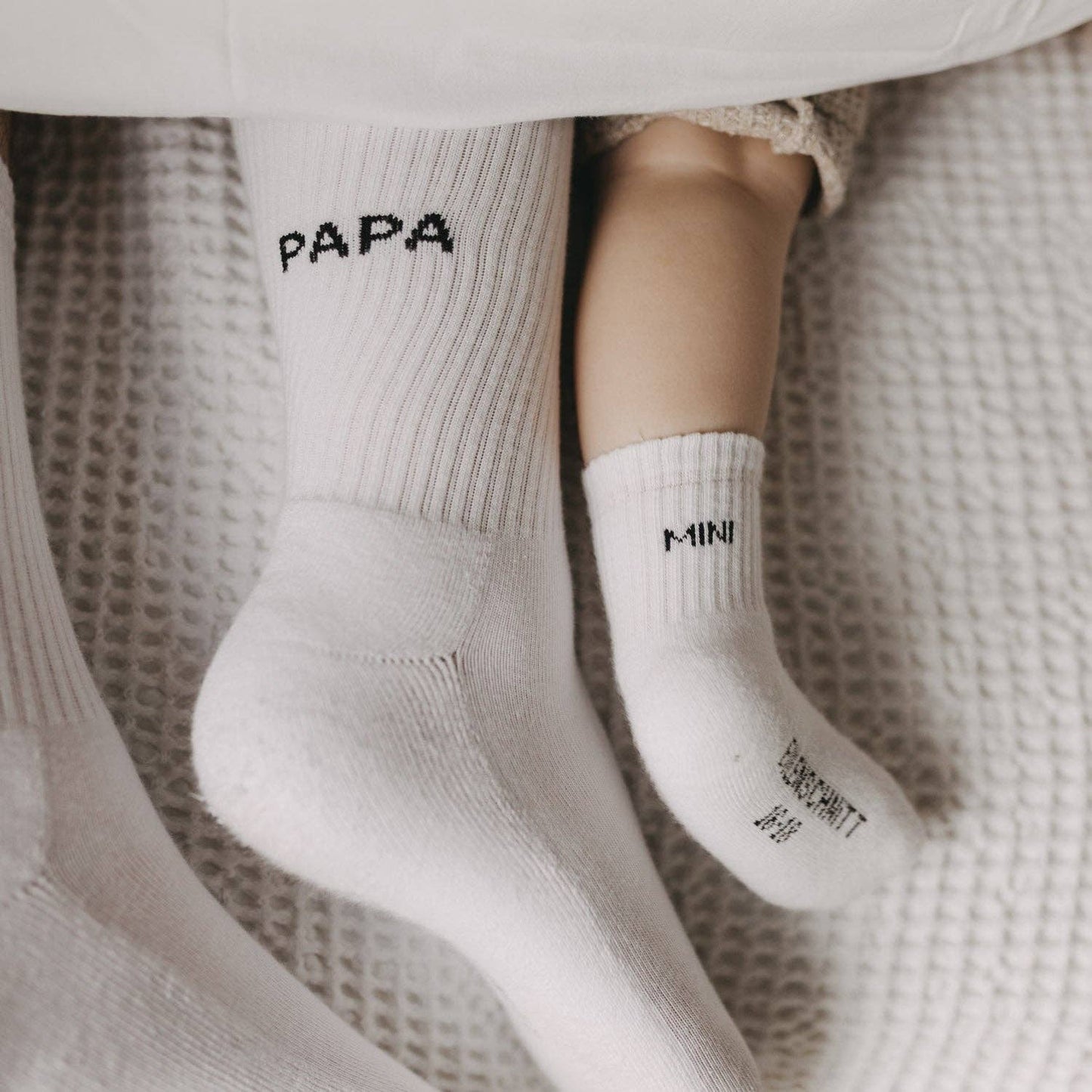 Soft Papa socks with minimalist Papa lettering on the cuff, designed as a comfortable everyday gift for dads.