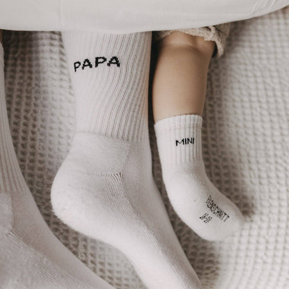 Soft Papa socks with minimalist Papa lettering on the cuff, designed as a comfortable everyday gift for dads.