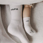 Soft Papa socks with minimalist Papa lettering on the cuff, designed as a comfortable everyday gift for dads.