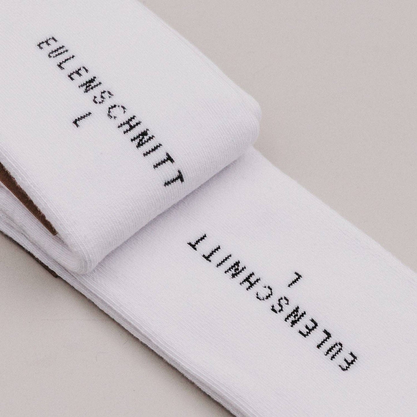 Soft Papa socks with minimalist Papa lettering on the cuff, designed as a comfortable everyday gift for dads.