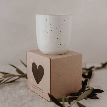 Calma handmade earthenware mug with natural glaze and minimalist design, handcrafted in Portugal with a 320ml capacity.