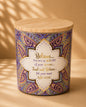 Decorative candle with motivational quote on a beige background