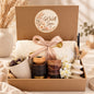 Get Well Soon gift box with cream knitted blanket, ceramic mug, chocolates, vanilla reed diffuser, sandalwood candle, boho vase and dried flowers.