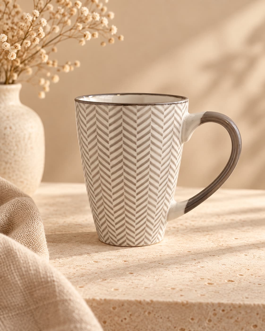 Get Well Soon gift box with cream knitted blanket, ceramic mug, chocolates, vanilla reed diffuser, sandalwood candle, boho vase and dried flowers.