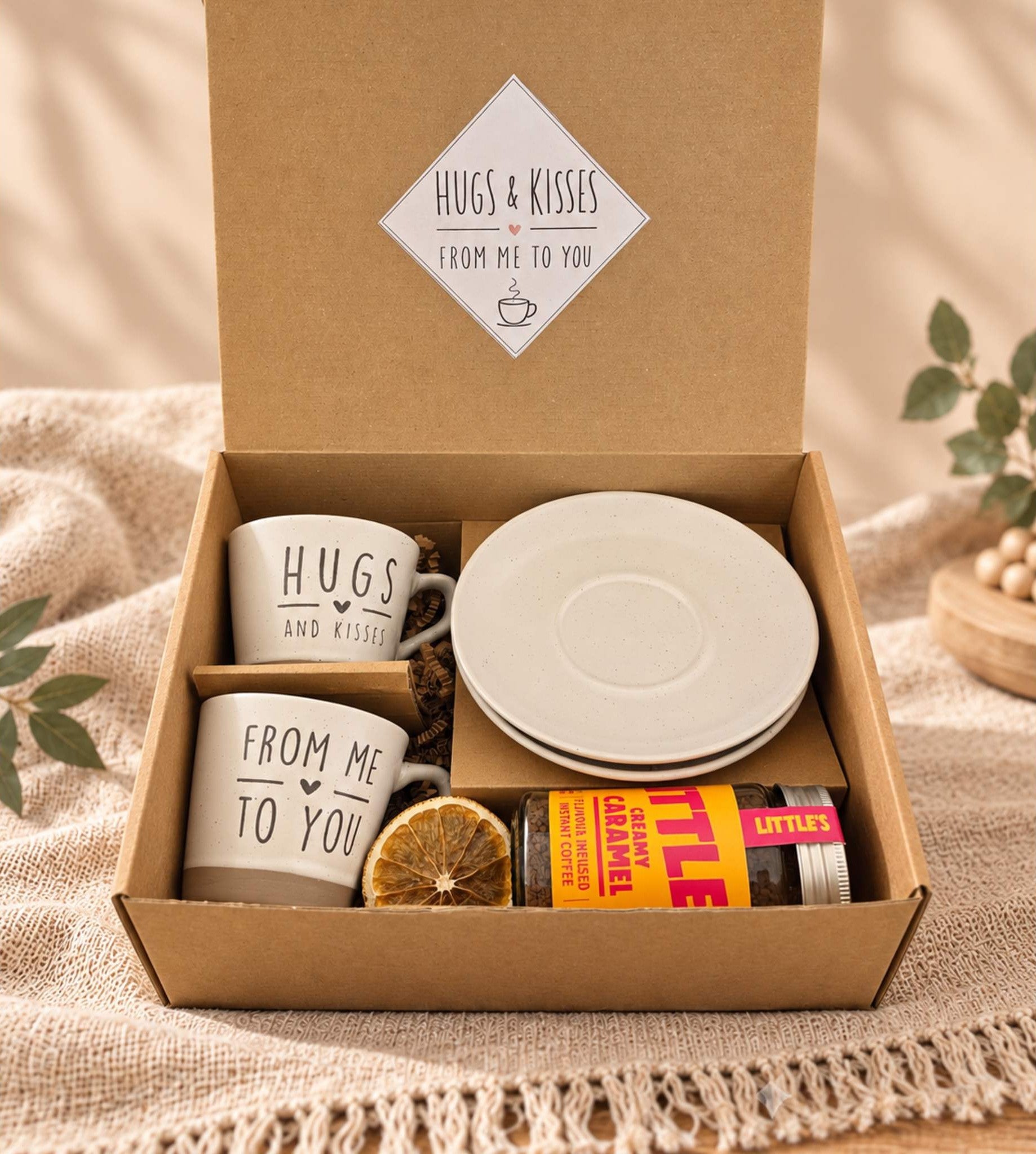 Open Hugs & Kisses coffee gift box by Gifting CY with two message mugs, saucers and Little’s Creamy Caramel Coffee