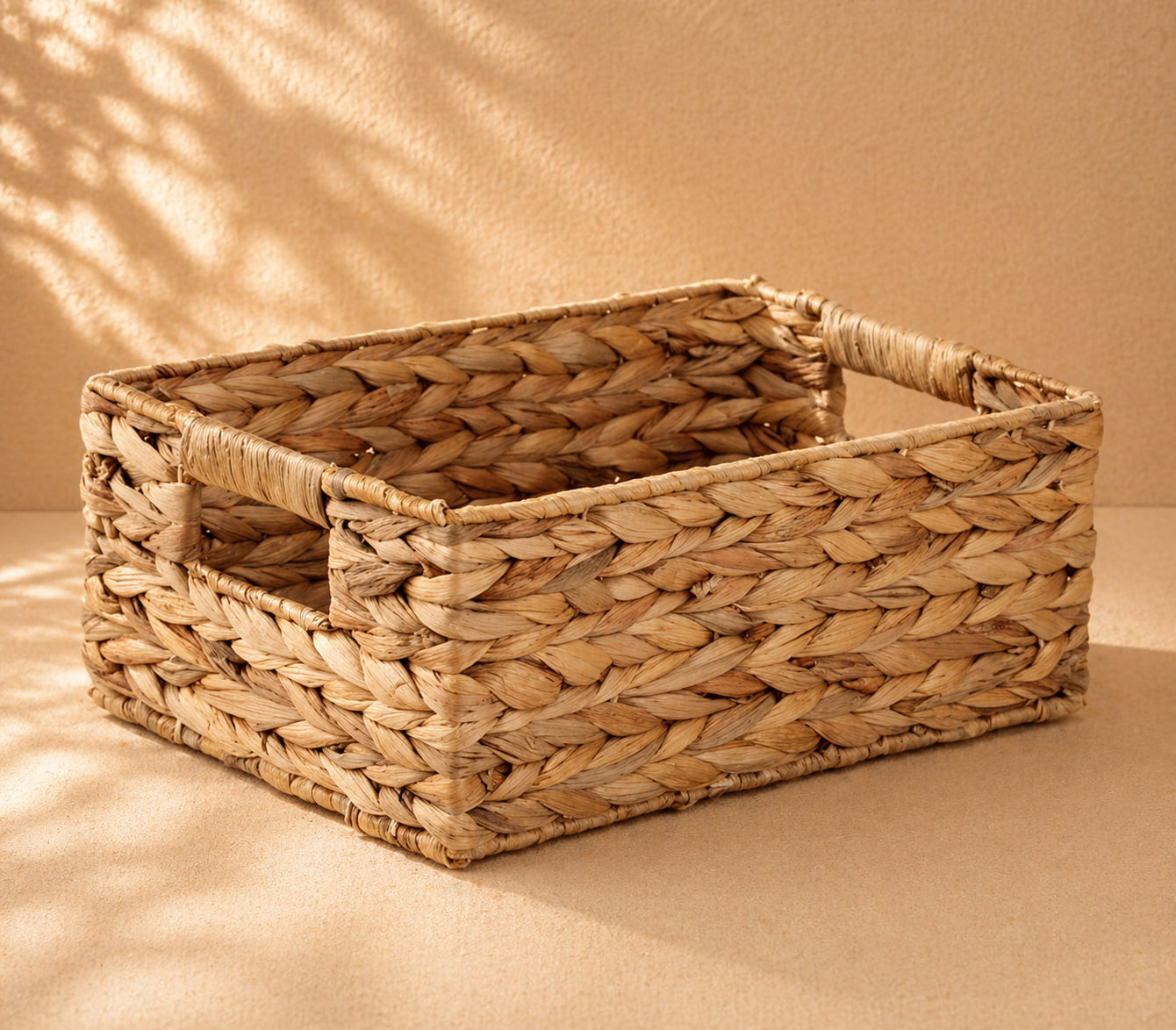 Woven basket on a beige background