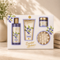 Essential Botanics Blueberry Bath Gift Set featuring nourishing shower gel, body lotion, bath salts, and massage sponge in elegant botanical packaging displayed on a soft neutral background.