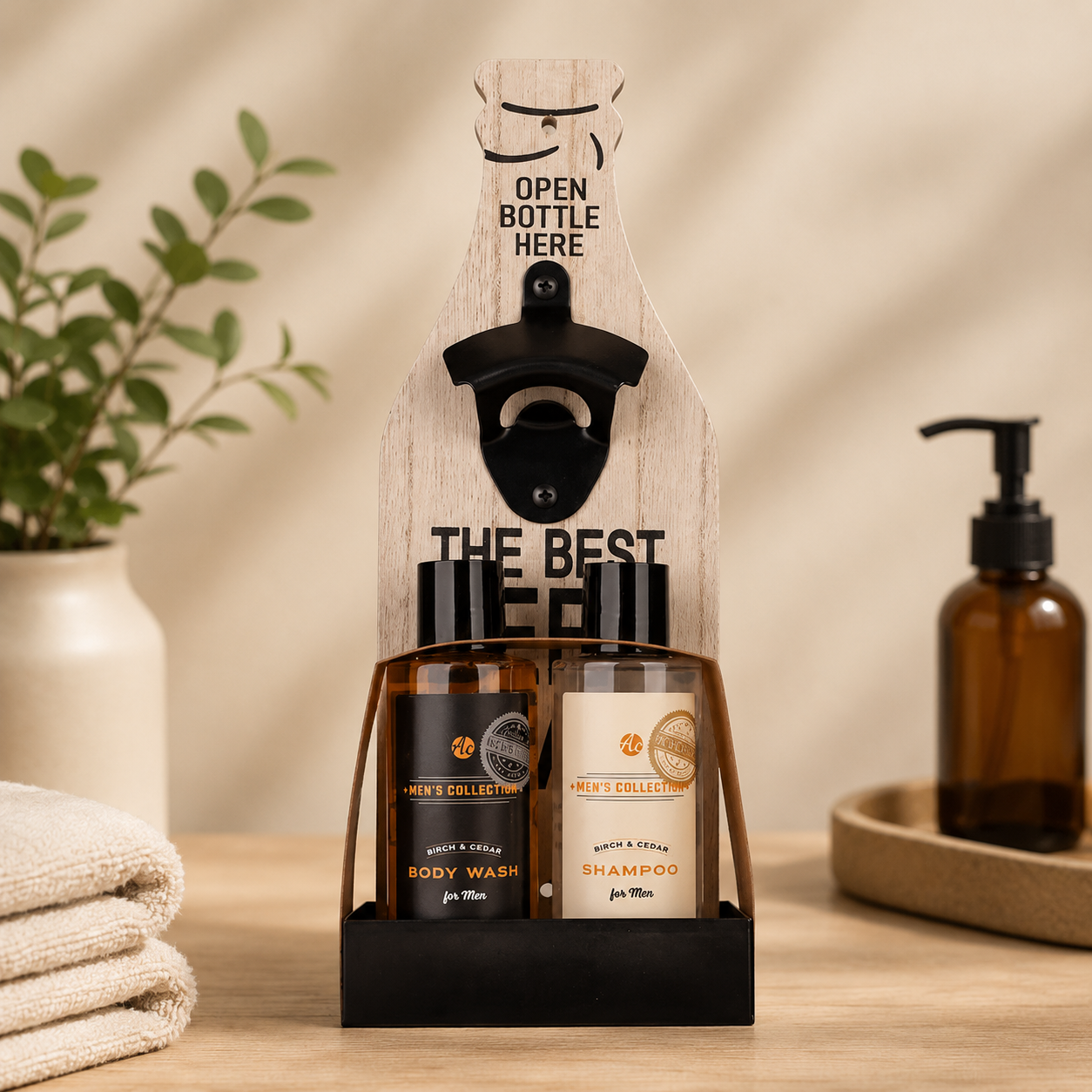 Men's grooming gift set featuring birch and cedar body wash, shampoo, and wooden wall-mounted bottle opener presented in stylish masculine gift packaging on a neutral background.