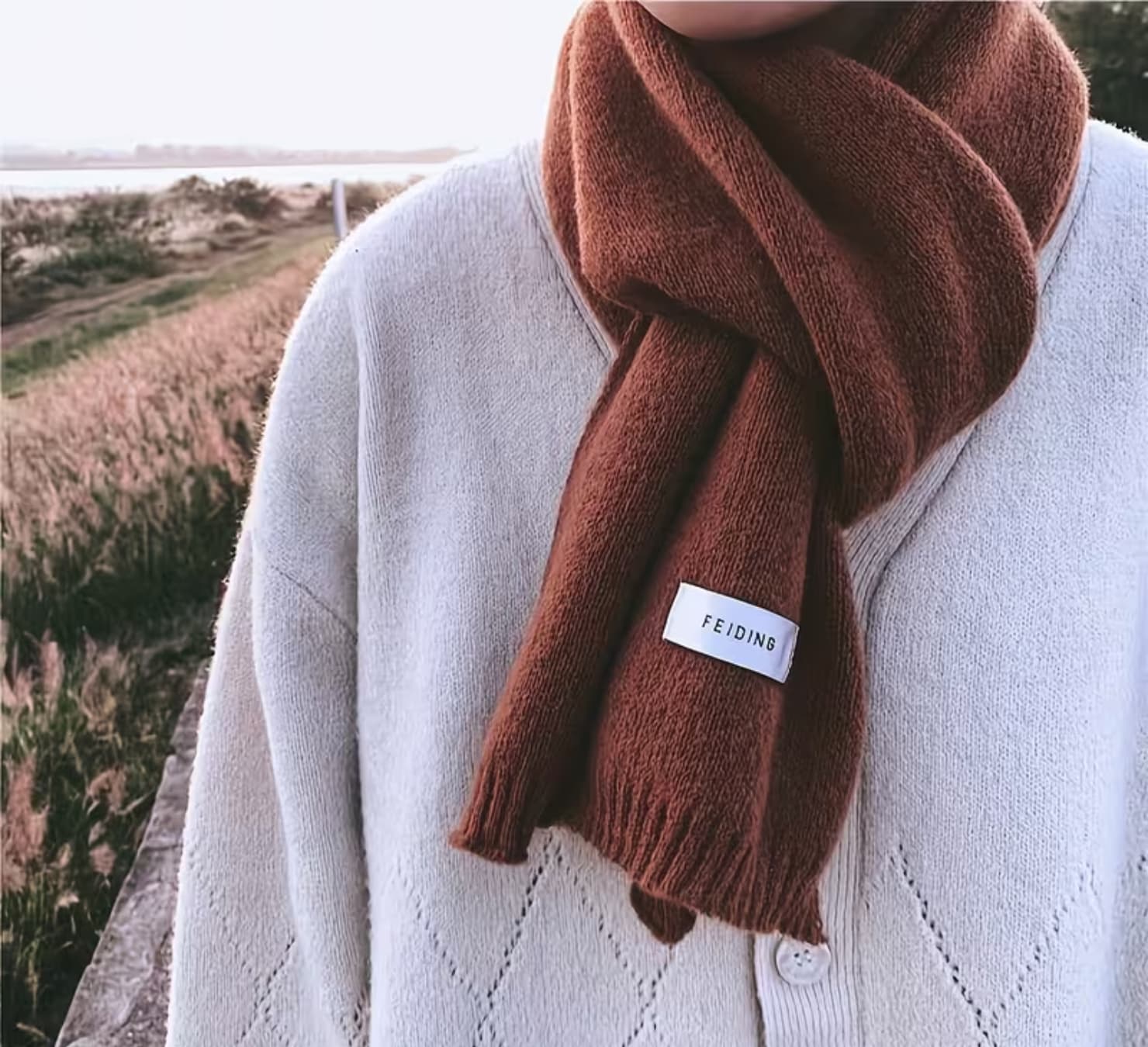 Heritage Man luxury gift box containing a brown leather-style toiletry bag, executive notebook with pen, coffee glass with wooden handle, and FEIDING brown scarf.