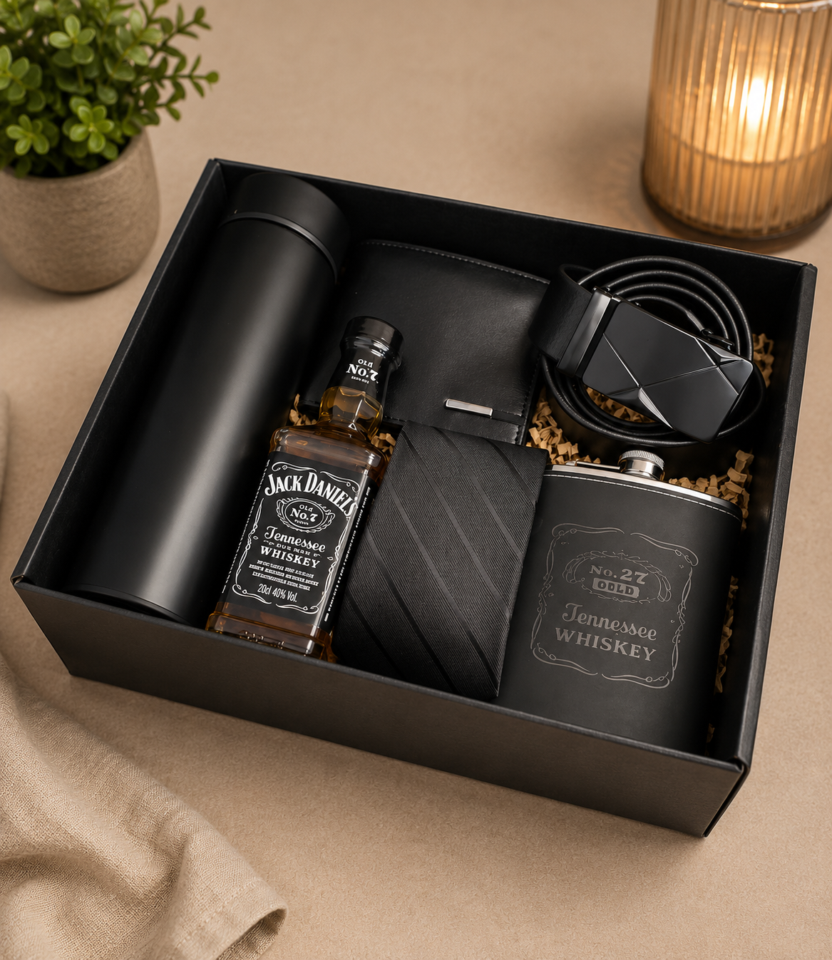 Luxury men's gift box featuring a black tie, wallet, belt, stainless steel flask, and digital temperature display tumbler, elegantly arranged in a premium black gift box.