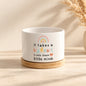 Mini white ceramic teacher planter with rainbow and It takes a big heart to help shape little minds message, on a bamboo tray.