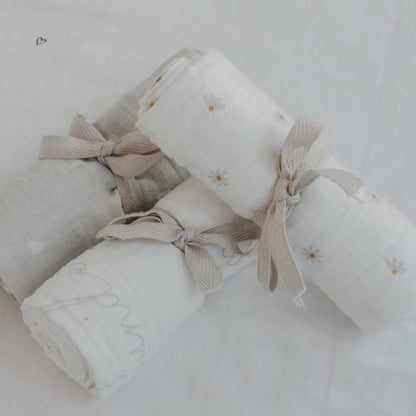 Hello Little Miracle 3-piece cotton muslin cloth set with heart, lettering and daisy designs for babies.