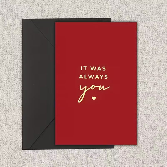Romantic greeting card with red background and gold text reading “It was always you”